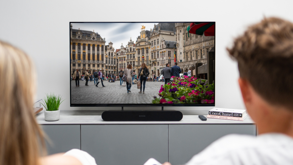 Small Screen TV being watched by couple