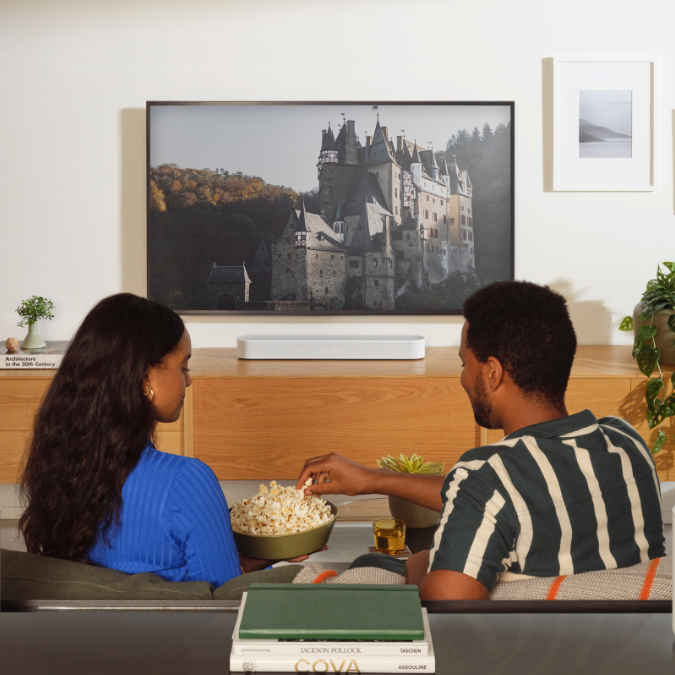 Couple Watching a film on TV